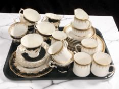 Twenty pieces of Paragon Athena tea china and a further nineteen pieces of Royal Albert Regina