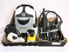 A Karcher steam cleaner and various accessories.