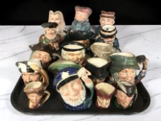 A collection of Toby and character jugs.