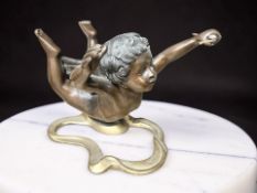 A contemporary hollow cast patinated bronze cherub coffee table support,