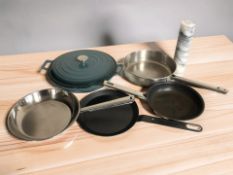 A turquoise enameled cast iron twin handled cooking pot with lid, diameter 38 cm,