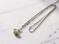 A 9ct gold swivel locket on chain CONDITION REPORT: 8.7g gross.