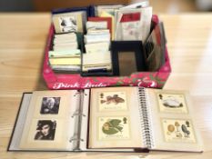A collection of modern postcards, Royal Mail mint stamps, etc.