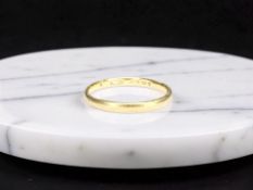 A 22ct gold band ring,