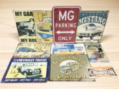 A group of reproduction enameled motoring signs.