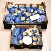 A collection of New Devon Pottery ceramic kitchen wares including many measuring jugs, bowls, etc.