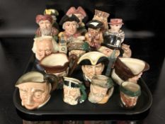A collection of Toby and character jugs.