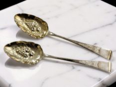 A pair of George III silver berry spoons, Thomas Streetin, London 1810, length 22.5cm.