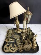 A quantity of horse brasses, ornaments, three lamp bases, etc.