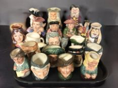A collection of Toby and character jugs.