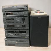 A Sony hi-fi system and a pair of speakers including a turntable, tuner,