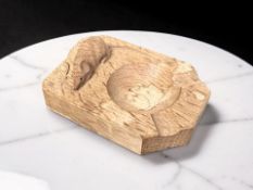 A Robert 'Mouseman' Thompson of Kilburn oak ash tray, 20th century, with carved mouse signature,