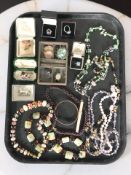 A collection of costume jewellery including glass and other faceted bead necklaces, dress rings,