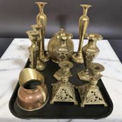 A pair of Indian Benares brass vases, three pairs of candlesticks, a jar and cover,