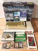 A Commodore 64C Brainbox computer compendium, with box.