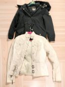 A lady's Barbour International coat, size 14, and a further Barbour cream coat, size 12.