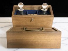 A reproduction decanter box containing two silver collared decanters, with key, box 27 cm wide.