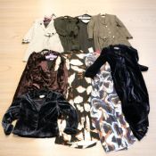Lady's clothing including a Max Mara three piece suit, Brora jackets, size 12 and 14, etc.
