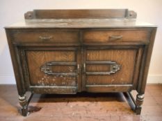 A mid-century oak sideboard, width 153 cm.