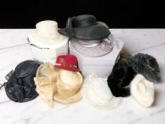 A quantity of lady's summer hats and simulated fur hats.