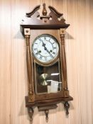 A reproduction Lincoln thirty-one day wall clock, height 72 cm.