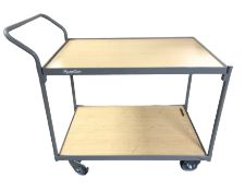 A Manutan two-tier trolley on castors, length 115 cm.