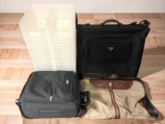 A Samsonite luggage case, plus another,