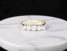 A 9ct gold five stone dress ring, size N CONDITION REPORT: 1.