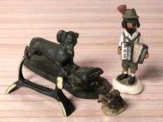 A Robert Harrop dog figure, plus three further dachshund ornaments.