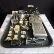 A group of miniature quartz timepieces, cast metal figurines, trinket boxes, etc.