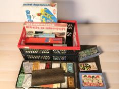Assorted board games, puzzles, vintage books.