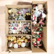 A collection of Christmas decorations, baubles, figures, etc.