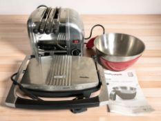A Breville sandwich toaster, Morphy Richards 3-in-1 digital jug scale and a Dualit toaster.