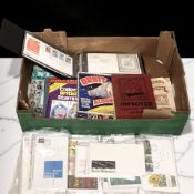 A collection of first day covers, stamp albums and other philatelic materials.
