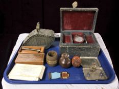 An antique jewellery box containing a small crystal perfume bottle with silver collar, treen items,