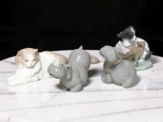 Two Nao hippos, a cat and a further group of a dog and cat.