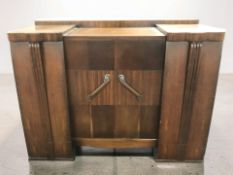 An Art Deco oak sideboard, width 140 cm.