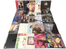 Vinyl LP records including Paul Young, Julian Lennon, The Human League, Cyndi Lauper,