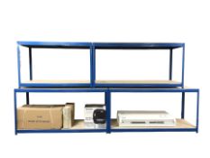 Four enameled metal and MDF rectangular two tier tables / workbenches, each 180 cm x 60 cm x 90 cm.