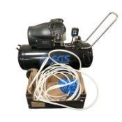 An SGS 100L air compressor model SC100V.