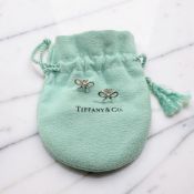 A pair of Tiffany & Co silver bow earrings, with post fittings,