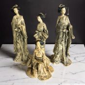 Four Japanese resin and pen work figures of geishas, tallest 41 cm.