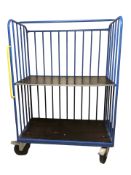 A two-tier metal goods trolley on castors, 128 cm x 73 cm x 180 cm.