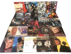 Vinyl LP records including The Rolling Stones, Michael Schenker, Rod Stewart and Small Faces.