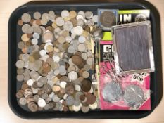 A collection of British pre-decimal and other world coins, a silver plated easel photo frame, etc.