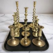 A pair of open barley twist brass candlesticks,