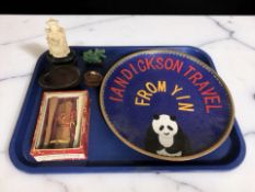 A cloisonne enameled charger depicting a panda, two small oriental figures, hand fans, etc.