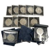 An assortment of commemorative crowns