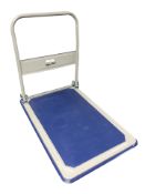 A Manutan flat bed trolley, length 90 cm.