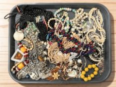 A quantity of costume jewellery, necklaces, faux pearls, beads, etc.
